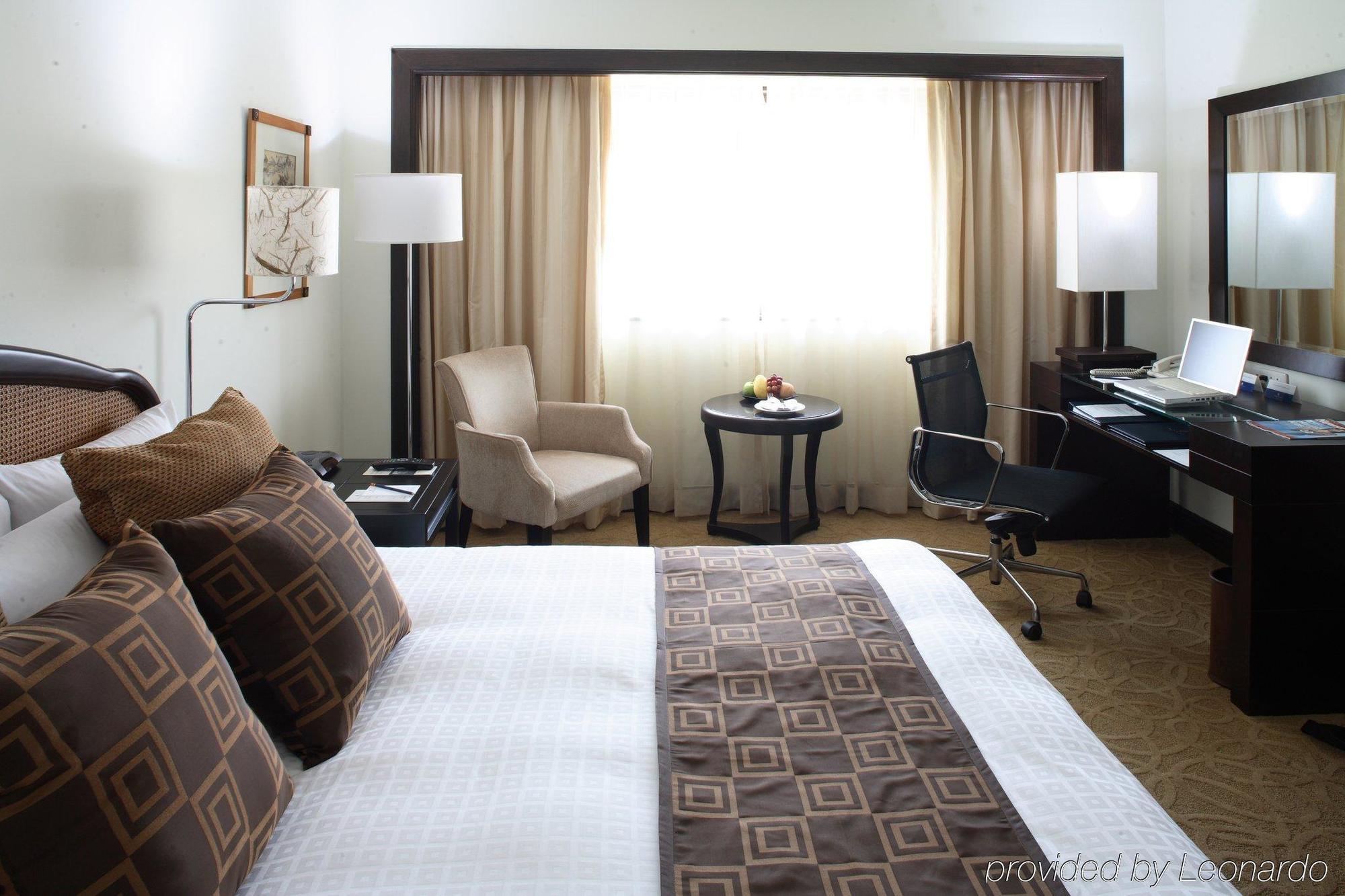 Intercontinental Manila Otel Makati City Oda fotoğraf